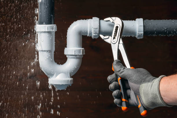 Professional Drain Cleaning technician working in Springs, NY
